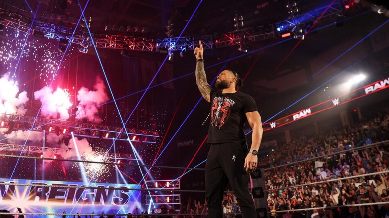 Roman Reigns poses in the middle of the ring during an episode of 