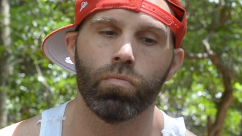 Nick Gage looks down