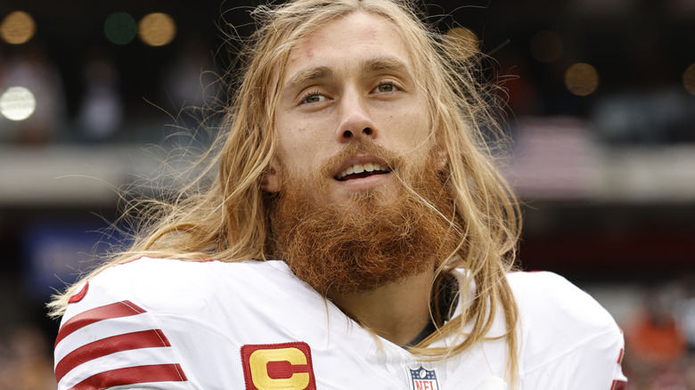 George Kittle wearing a football jersey