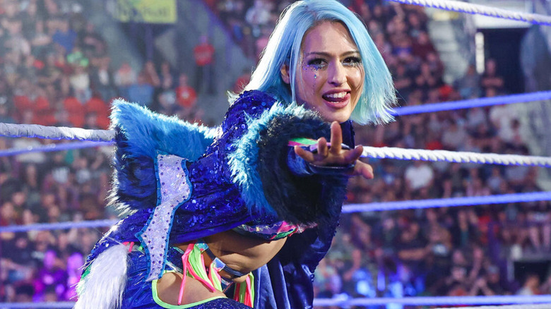 Giulia wearing a sparkly blue ring jacket