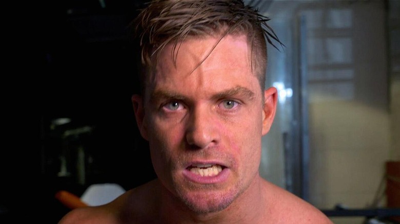Grayson Waller during a heated backstage promo at a SmackDown show.