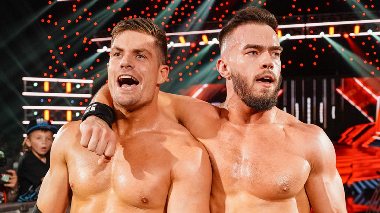 Grayson Waller and Austin Theory of A-Town Down Under celebrate their win during Monday Night RAW at CFG Bank Arena on August 5, 2024 in Baltimore, Maryland.