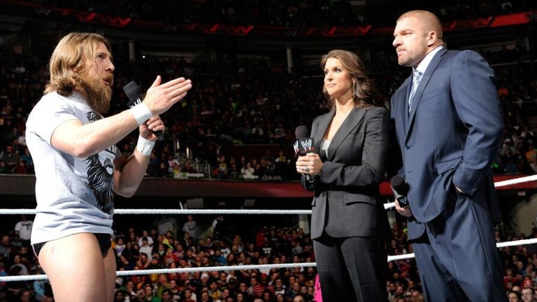 Daniel Bryan exchanges words with Triple H and Stephanie McMahon