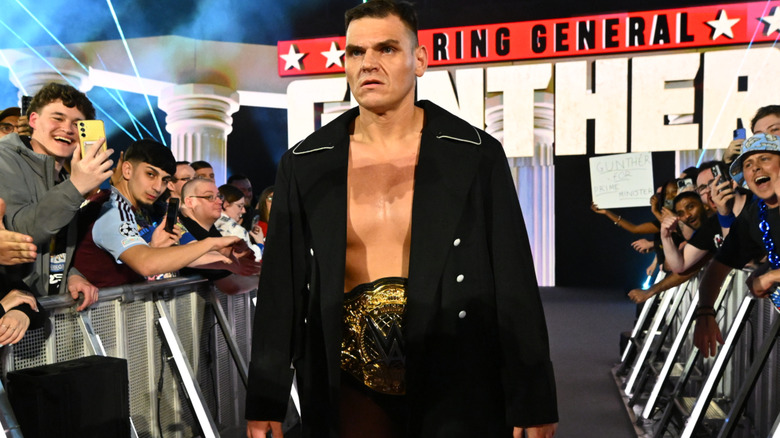 World Heavyweight Champion Guther makes his entrance during Monday Night RAW at The O2 Arena on March 31, 2025 in London, England.