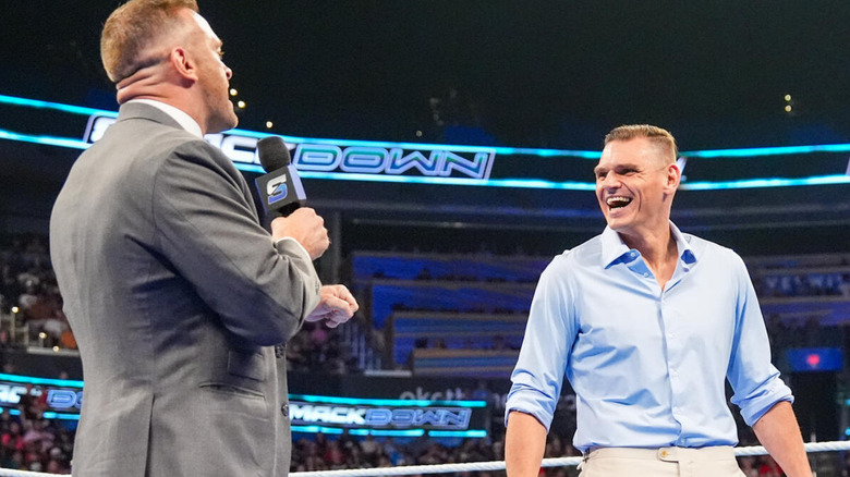 GUNTHER laughing at Nick Aldis
