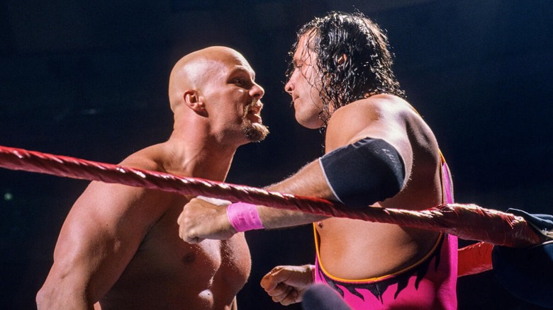 Stone Cold Steve Austin staring down Bret Hart during Survivor Series 1996.
