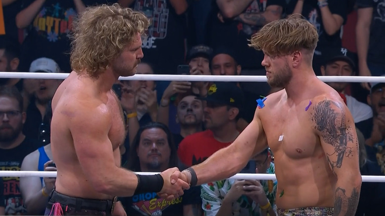 "Hangman" Adam Page and Will Ospreay shake hands