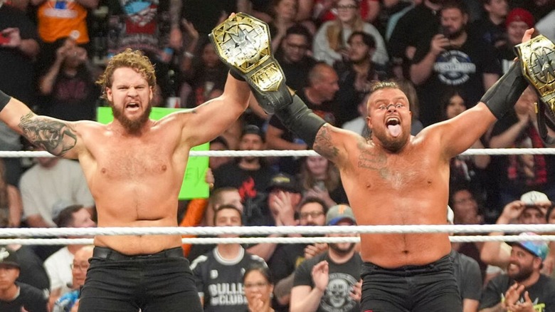 Hank Walker and Tank Ledger hold up the 