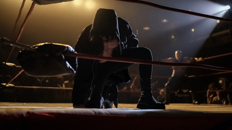 The Condamned kneels in the ring 