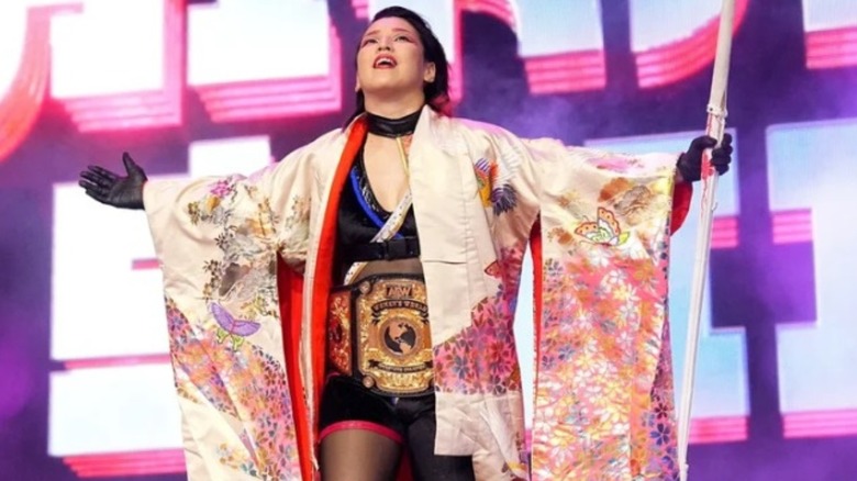 AEW's Hikaru Shida makes her way to the ring on an episode of "AEW Dynamite" with the women's championship.