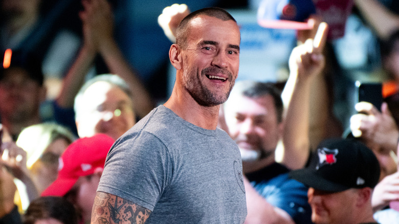 CM Punk smiles on his way to the ring 