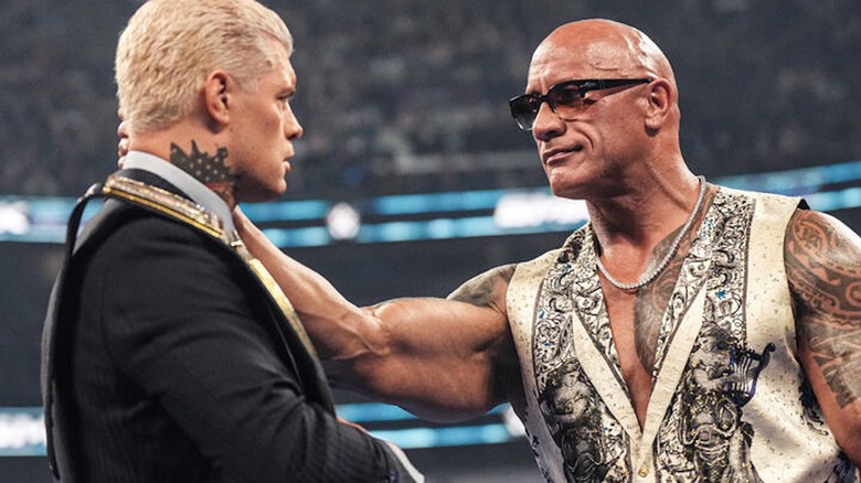 The Rock embraces a shocked Cody Rhodes.