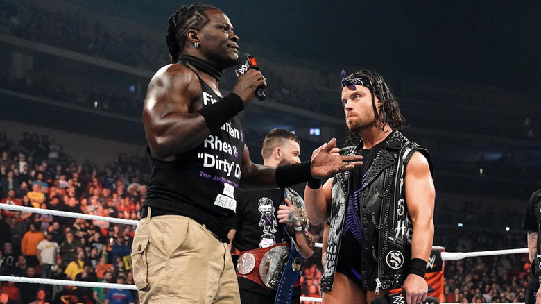 R-Truth addresses The Judgment Day's JD McDonagh on the microphone in the ring during "WWE Raw."