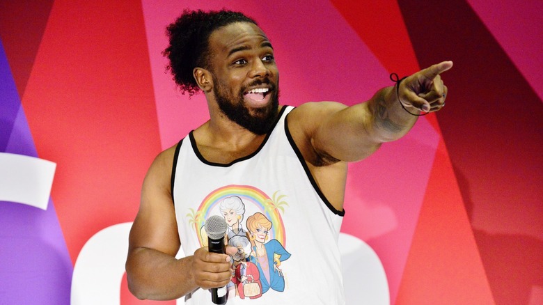 Xavier Woods points out at the crowd