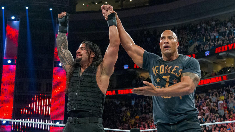 Roman Reigns and The Rock celebrating