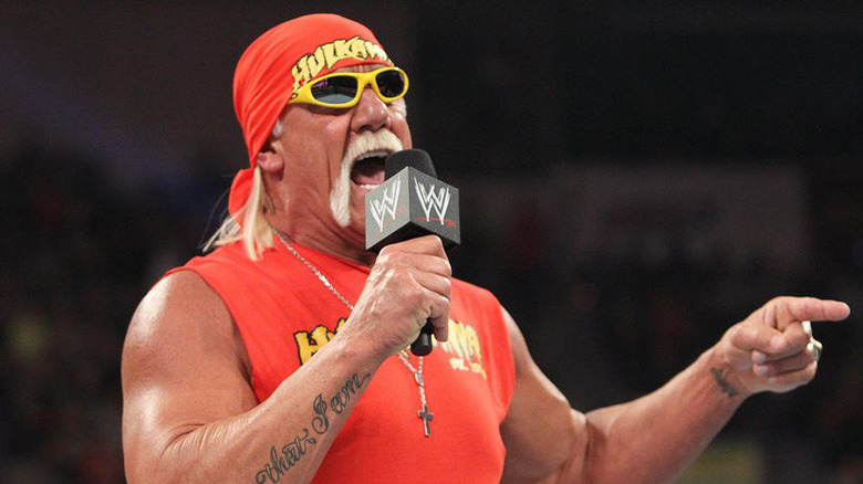 Hulk Hogan talking into a WWE microphone