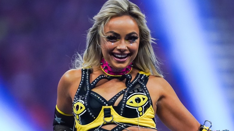 Liv Morgan smiling against the ring ropes