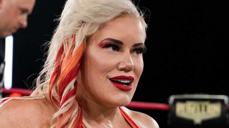 Taya Valkyrie smirks