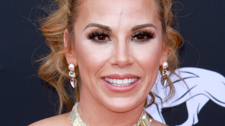 Mickie James smiling on the red carpet