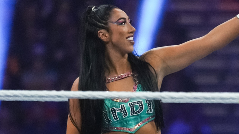 Indi Hartwell wearing green ring gear
