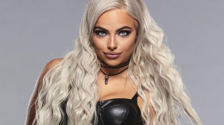 WWE star Liv Morgan poses for the camera in a backstage photoshoot. 