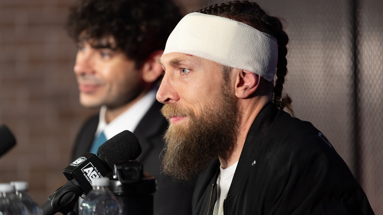 Bryan Danielson smiling in head bandage