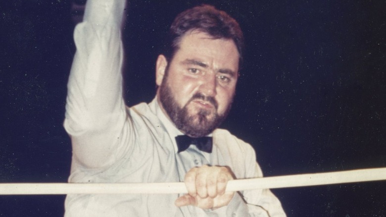 Referee Tim White in the ring