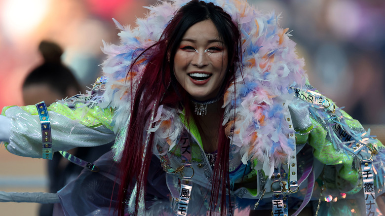 IYO SKY wearing a light blue ring jacket