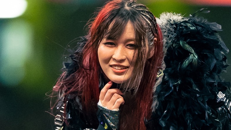 Iyo Sky grinning during an entrance