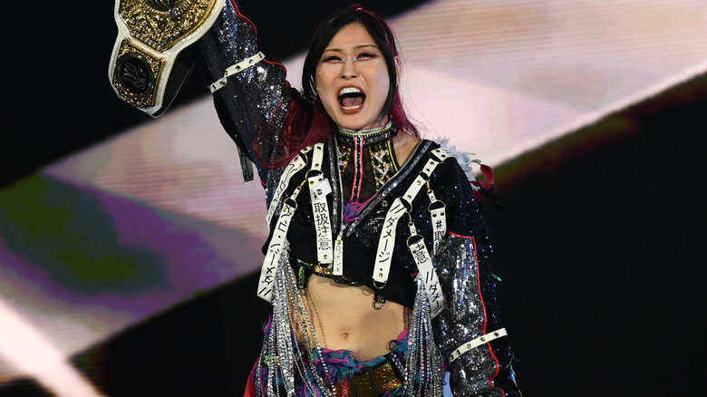 IYO SKY holding the WWE Women's World Championship