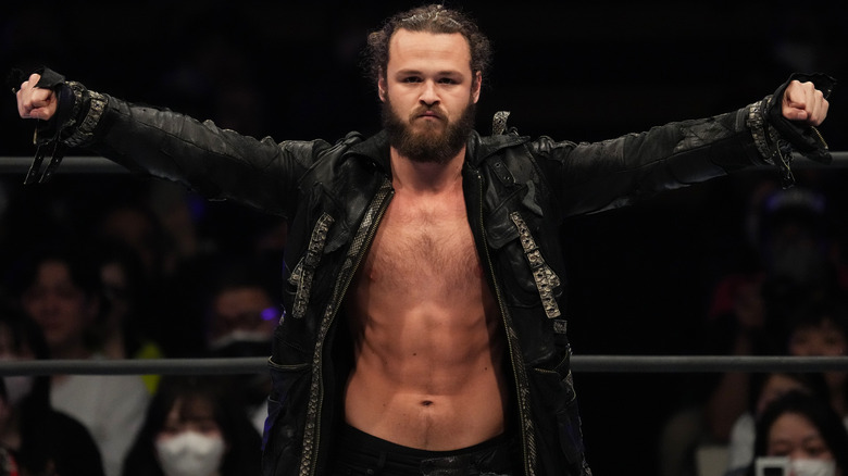 Jack Perry wearing a black jacket
