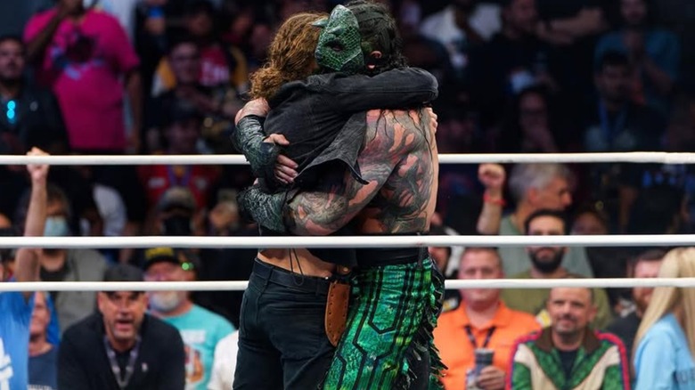 Jack perry and Luchasaurus reuinting during AEW All Out 2025.