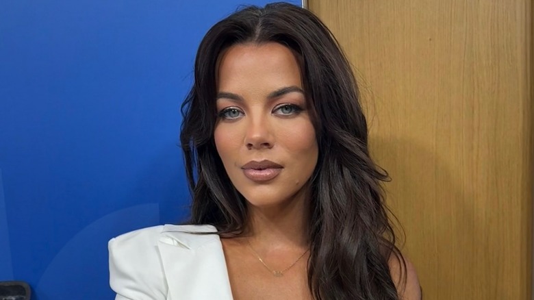 Jackie Redmond poses backstage for a photo