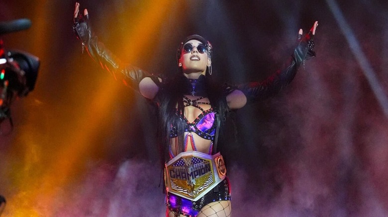 Women's United States Champion Jacy Jayne poses on the stage during her entrance ahead of the 2026 women's Money in the Bank ladder match.