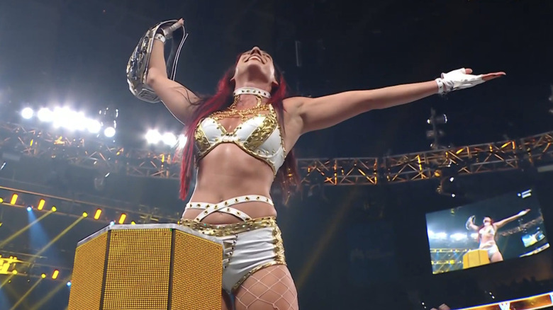 Jacy Jayne smiles as she celebrates a victory as the 