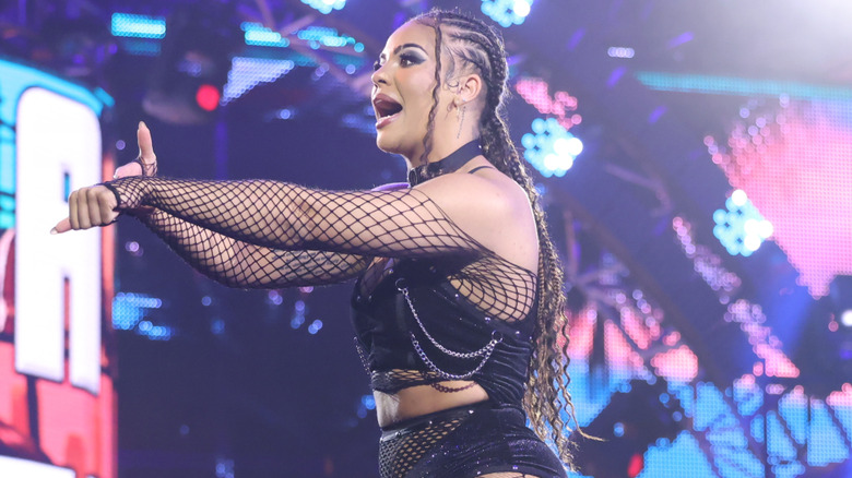Jaida Parker pointing to her wrist