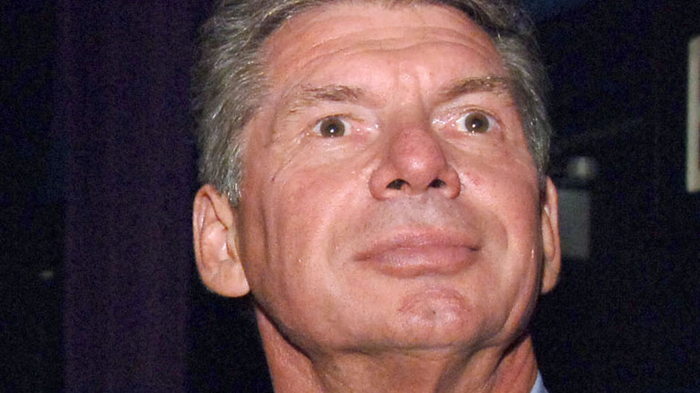 Vince McMahon looks away