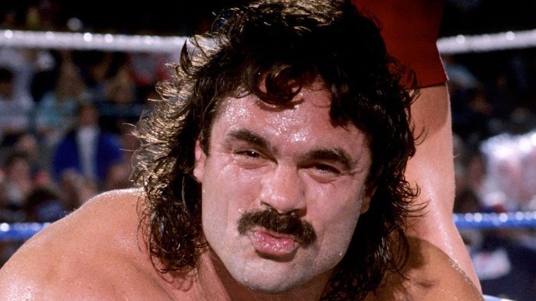 Rick Rude blows a kiss to the camera