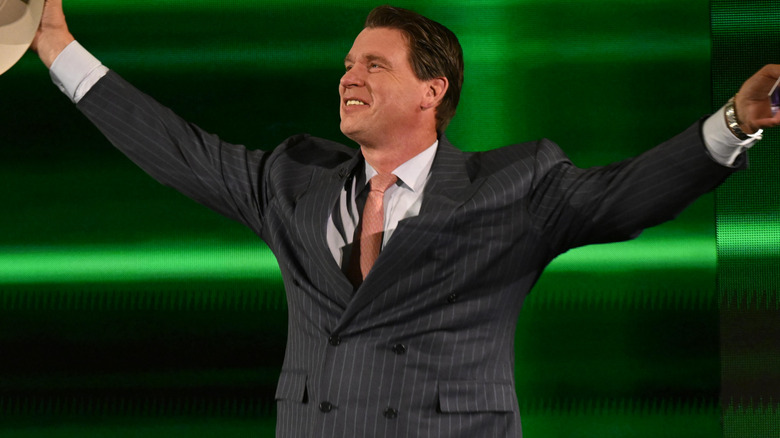 JBL raising his arms