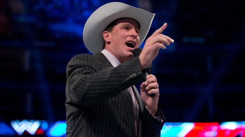 WWE Hall of Famer JBL talks to the crowd during a WWE event