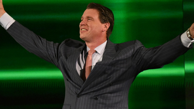 JBL raising his arms