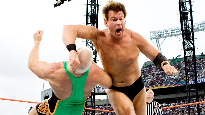 JBL knocking Finlay down with his Clothesline From Hell Finisher.