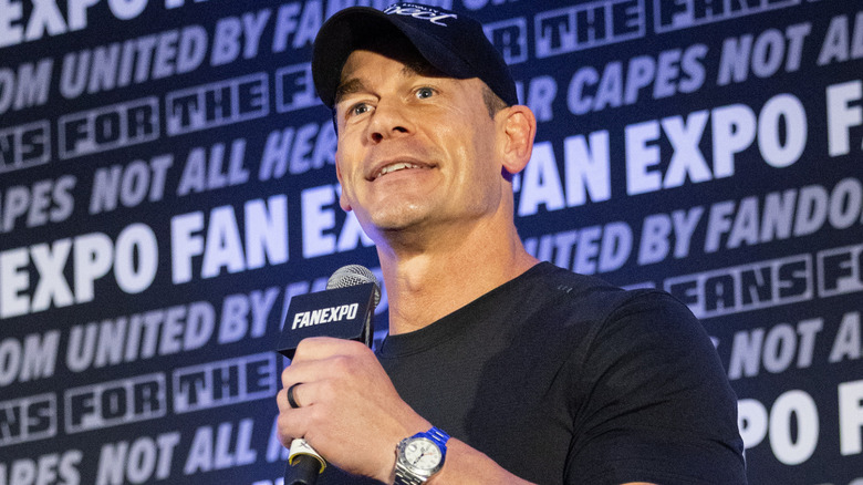 John Cena holding a microphone