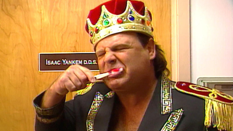 Jerry Lawler brushing his teeth