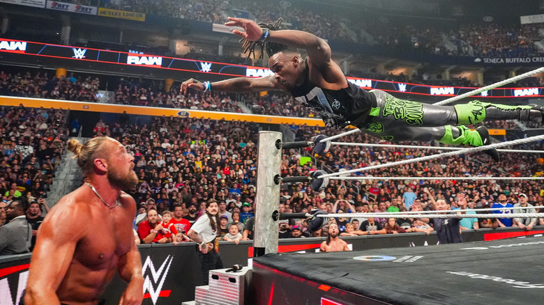 Je'Von Evans diving onto Big Cass on WWE Raw