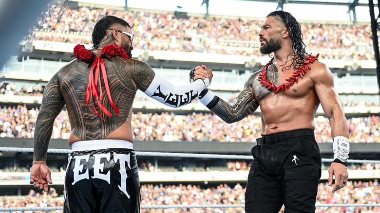 Jey Uso and Roman Reigns share a mutual showing of respect at SummerSlam 2025.