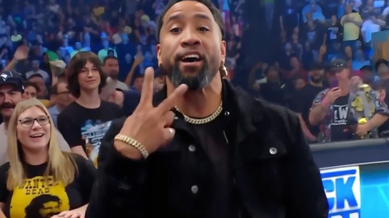 Jey Uso flashes the peace sign