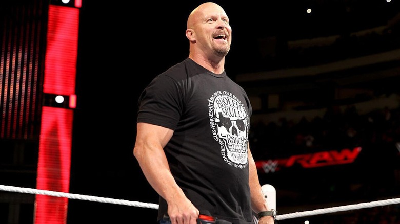 "Stone Cold" Steve Austin laughs along with the crowd.