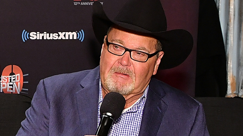 Jim Ross speaking into mic