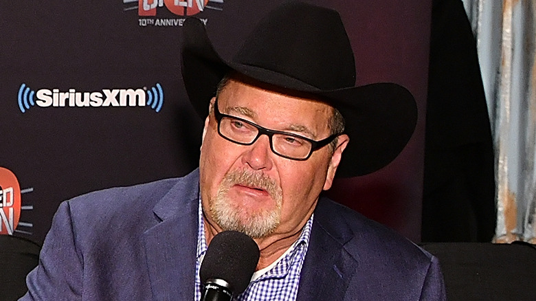 Jim Ross in front of a microphone